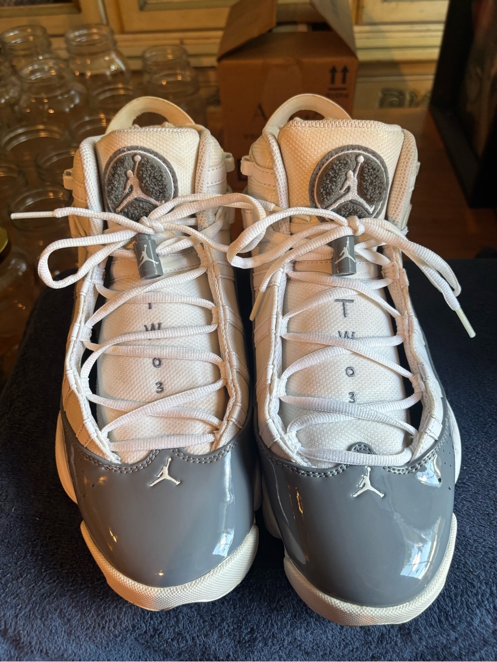 Jordan Retro 11 Low White & Grey Patent Leather Sneakers